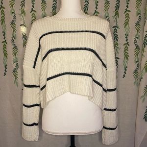 Black and off-white sweater. Good condition. Lightly worn with no major flaws